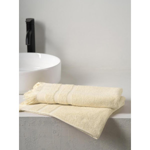 Полотенце махровое "Elegance" с бахромой светло-бежевый Полотенце махровое "Elegance" с бахромой светло-бежевый